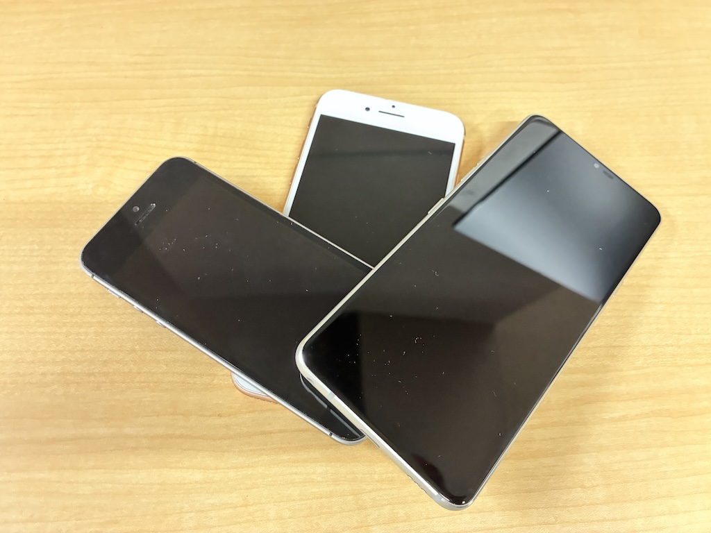 三支不同款手機並排——iPhone舊款、iPhone新款、Android旗艦，皆支援eSIM日本上網